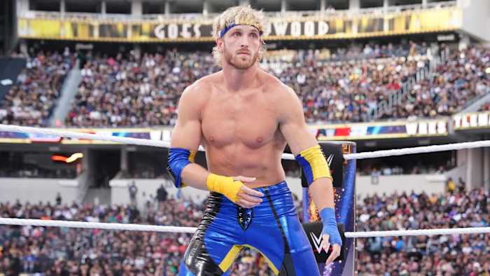 WWE superstar Logan Paul competes in a WrestleMania match against Seth Rollins.